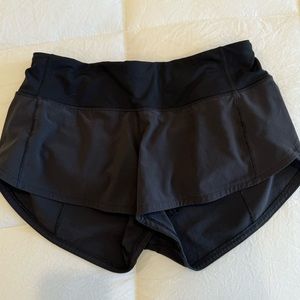 Size 2 Lululemon 2.5 speed up low rise shorts.